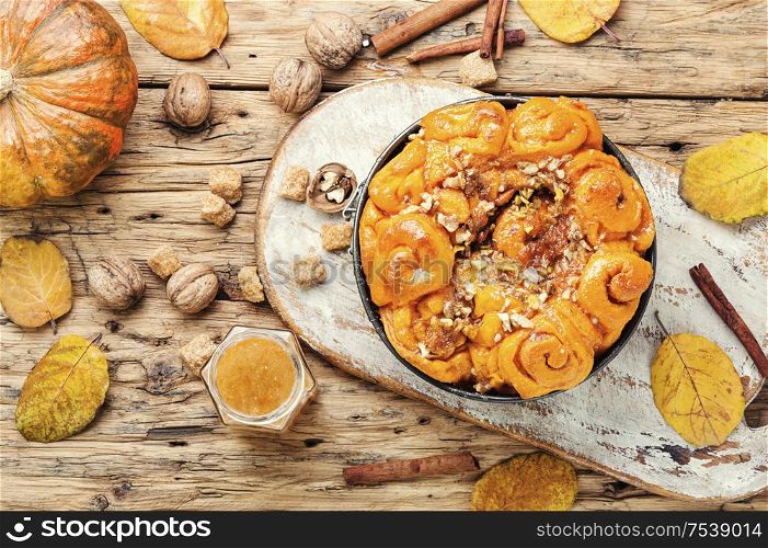 Pumpkin buns with nuts and brown sugar.Cinnamon rolls or cinnabon. Cinnabon cinnamon rolls