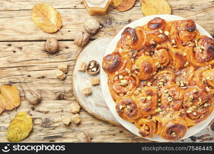 Pumpkin buns with nuts and brown sugar.Cinnamon rolls or cinnabon. Cinnabon cinnamon rolls