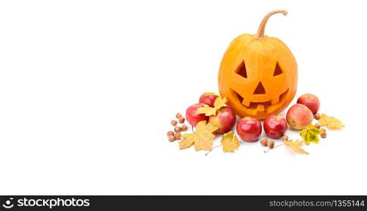 Pumpkin-head, nuts, apples and yellow leaves isolated on white background. Free space for text.