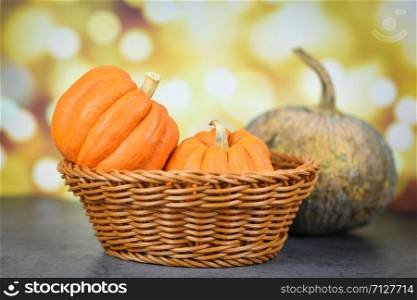 Pumpkin in the basket / Pumpkin decorate holiday season autumn with bokeh background