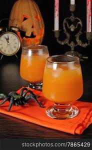 Pumpkin juice with ice on Halloween