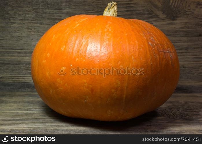 Pumpkin on wooden background