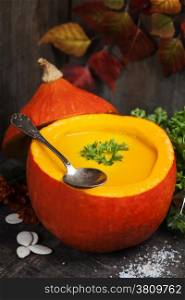 Pumpkin soup for halloween party or thanksgiving day concept