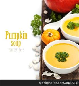 Pumpkin soup for halloween party or thanksgiving day concept (with easy removable sample text)