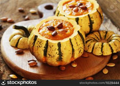 Pumpkin soup served in a hollowed pumpkins