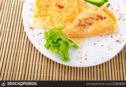 Pumpkin stuffed panckes in the plate