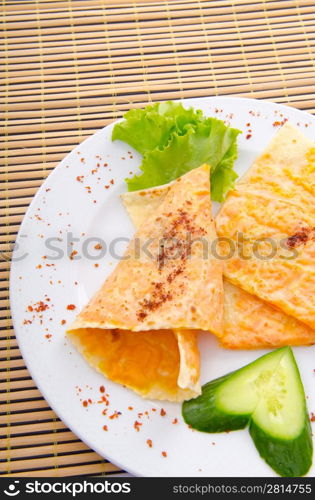 Pumpkin stuffed panckes in the plate