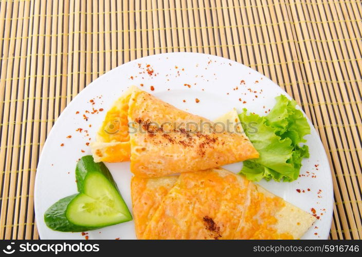 Pumpkin stuffed panckes in the plate