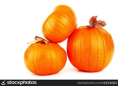 Pumpkins &amp; dry leaves isolated on white