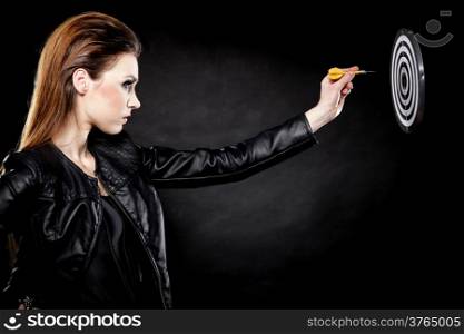 punk girl with arrow dart and target black backgruond