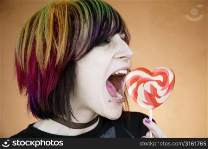 Punk girl with lolly pop