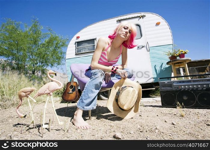 Punk in front of a trailer