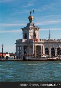 Punta della Dogana in Venice with Golden Ball at the Grand Canal in Venice, Italy