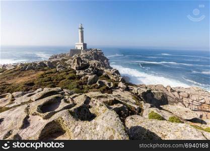 Punta Nariga Lighthouse at sunny summer day, Spain