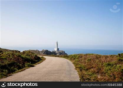 Punta Nariga Lighthouse at sunny summer day, Spain