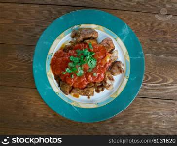 puntas de filete - grilled meat with chili sauce.Mexican food