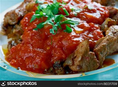 puntas de filete - grilled meat with chili sauce.Mexican food
