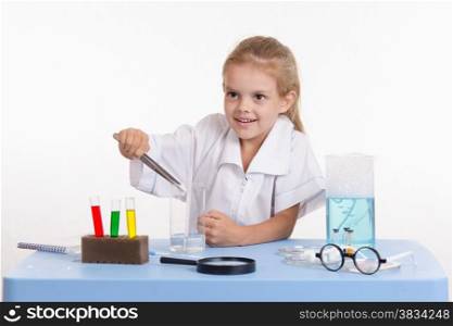 Pupil at a school desk in chemistry class