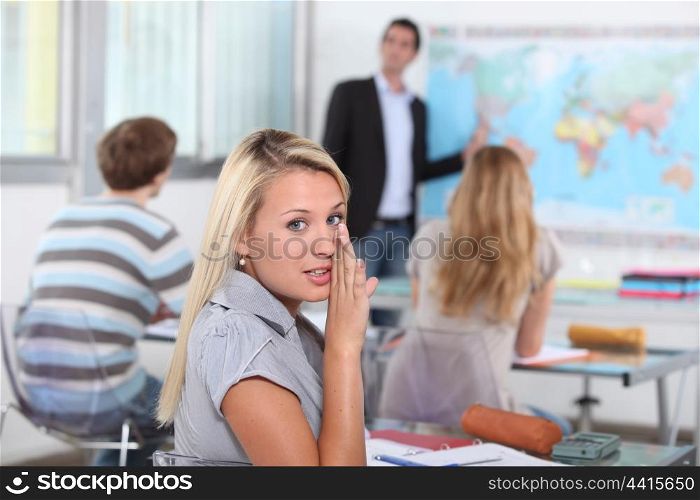 Pupil whispering in class