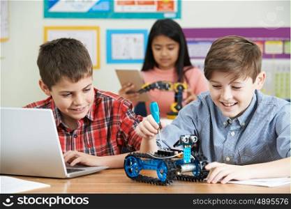 Pupils In Science Lesson Studying Robotics