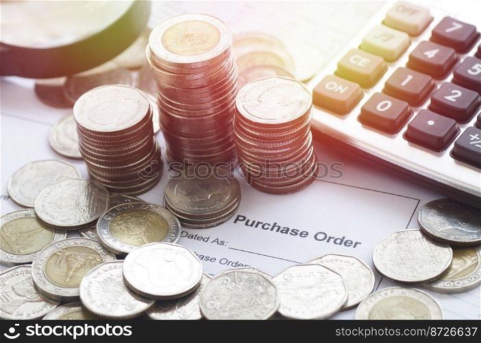 purchase order with calculator and money coins, concept in account and business