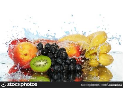 Pure fruit in a spray of water isolated on a white background.
