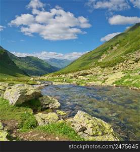 Pure river in mountain valley. Nature landscape composition.
