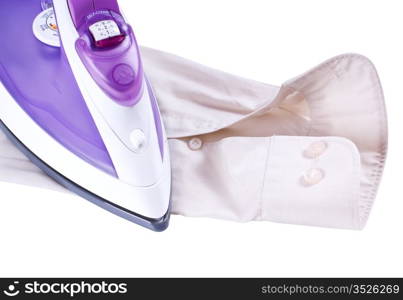 purple and white smoothing-iron on beige shirt isolated