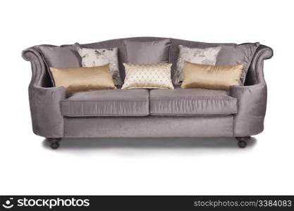 Purple couch on white background with throw pillows
