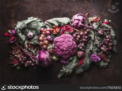 Purple fruits and vegetables setting. Anthocyanins health benefits as dietary antioxidants. Top view. Flat lay.