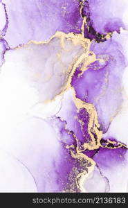 Purple gold abstract background of marble liquid ink art painting on paper . Image of original artwork watercolor alcohol ink paint on high quality paper texture .. Purple gold abstract background of marble liquid ink art painting on paper .