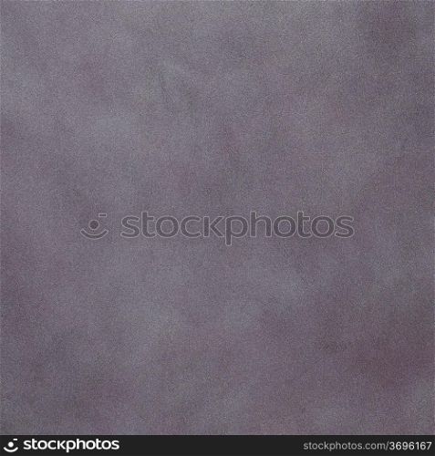 Purple leather texture closeup background.