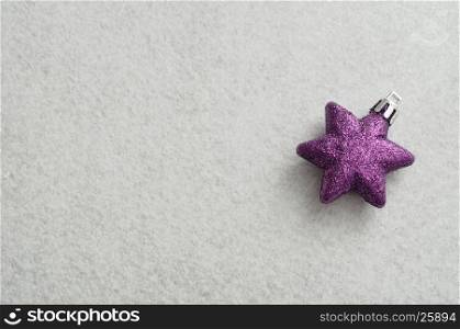 Purple star to decorate a christmas tree