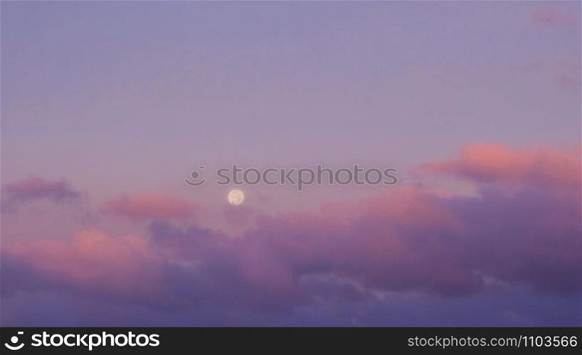 Purple sunset sky with full moon. Nature background