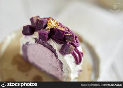 Purple sweet potato roll cake, selective focus . Purple sweet potato roll cake