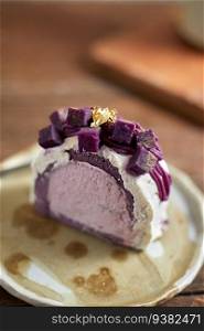Purple sweet potato roll cake, selective focus . Purple sweet potato roll cake