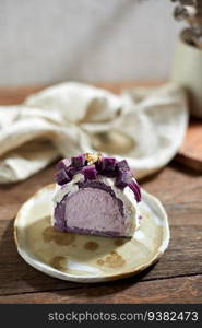 Purple sweet potato roll cake, selective focus
. Purple sweet potato roll cake