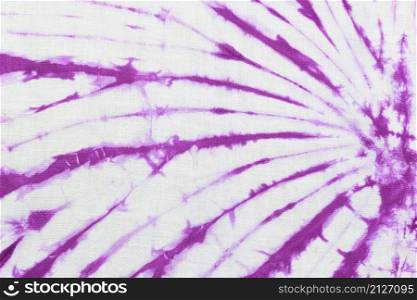 Purple tie dye fabric texture background for design in your work.