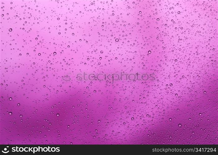 Purple water drops background. Water collection.
