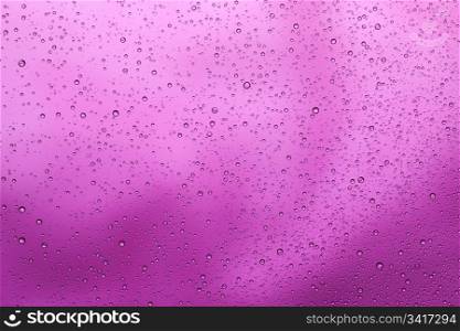 Purple water drops background. Water collection.