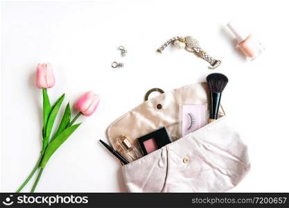 purse of cosmetics and women accessories on white background,Copy space ,top view