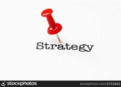 Push pin on strategy text
