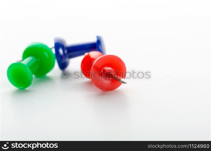 Push-pins close-up isolated on white background
