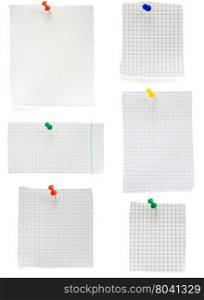 pushpin and checked note paper isolated on white background