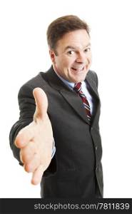Pushy salesman with an oversized grin, coming in for a handshake. Isolated on white.