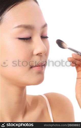Putting on make-up