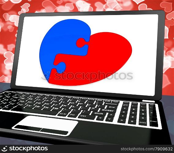 . Puzzle Heart On Laptop Shows Engagement And Marriage