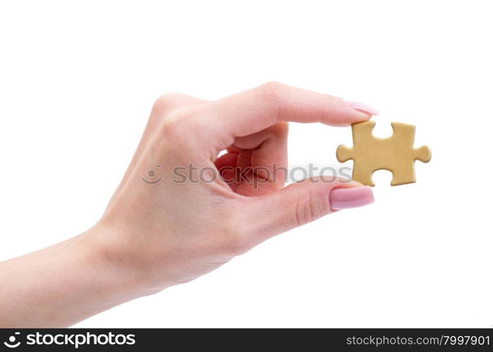 puzzle in hand isolated on white