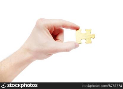 puzzle in hand isolated on white background