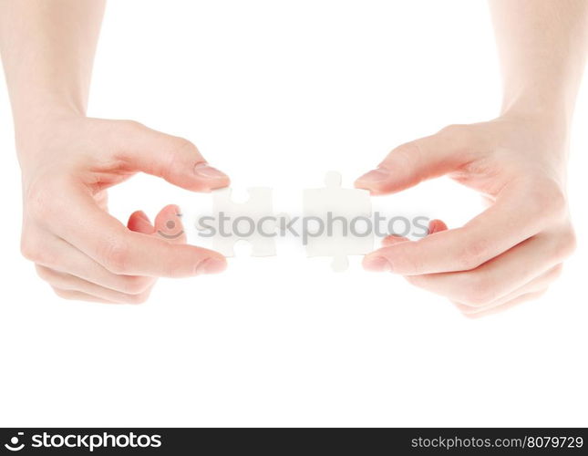 puzzle in hand isolated on white background